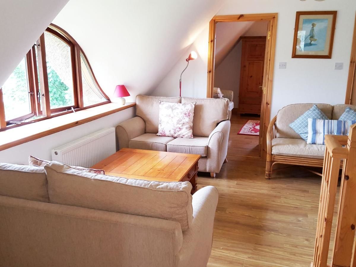 Дома для отпуска Self Catering Donegal - Teac Chondai Thatched Cottage Loughanure-8