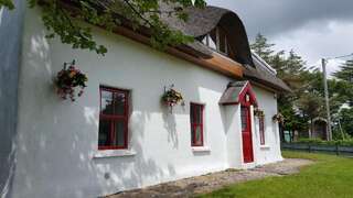 Дома для отпуска Self Catering Donegal - Teac Chondai Thatched Cottage Loughanure Дом для отпуска-1